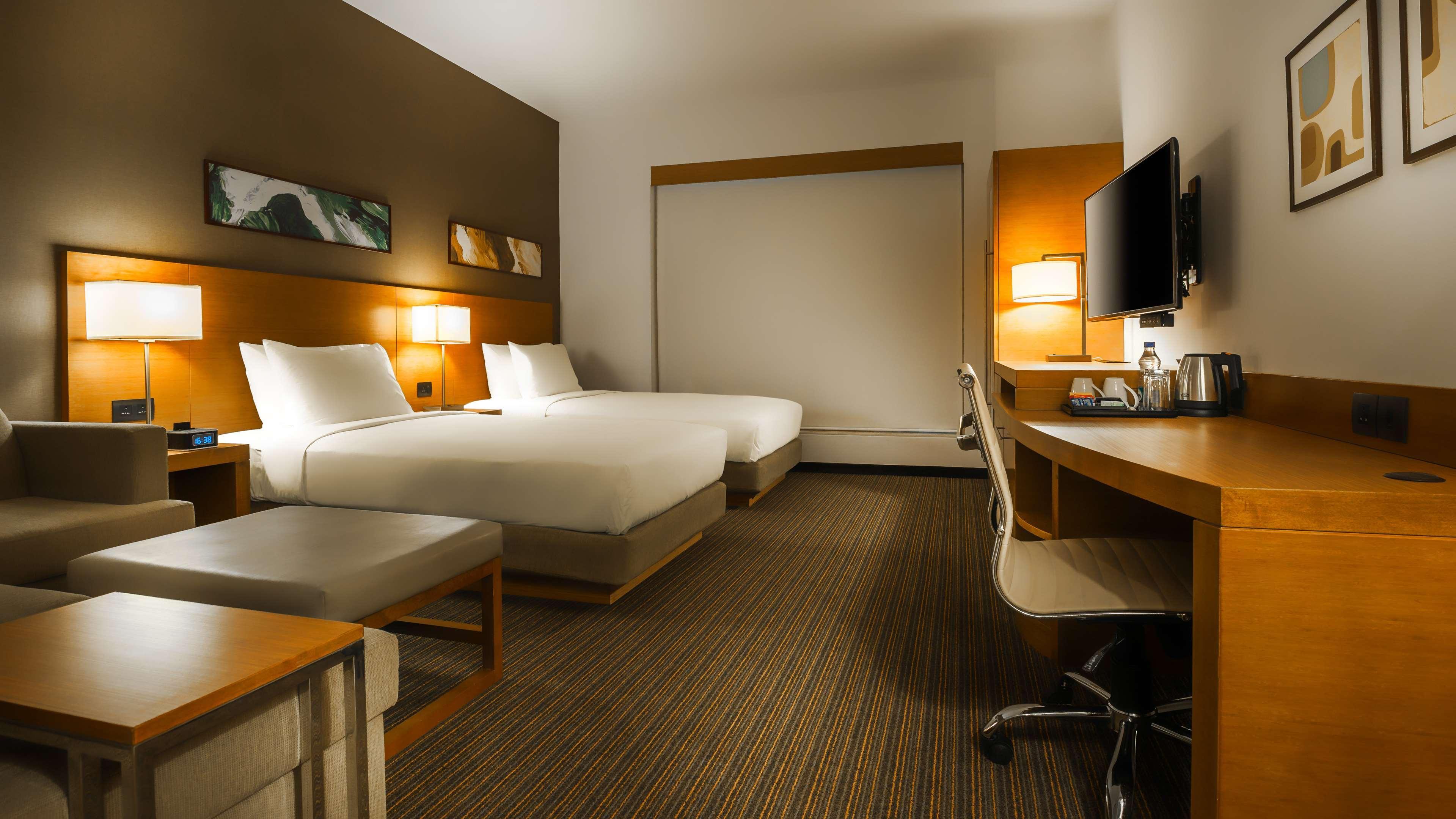 Hyatt Place Gurgaon Udyog Vihar Екстер'єр фото A typical room at the Holiday Inn Express
